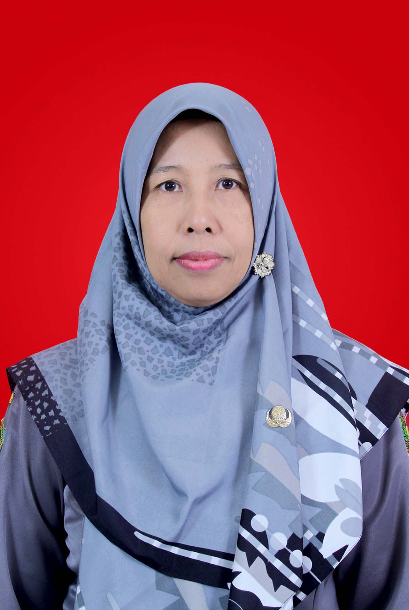 Dra. ENIE TRI PURWANINGSIH